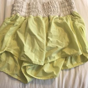 Yellow lululemon running shorts size 4